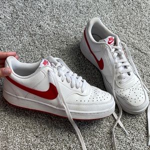 Lightly used White and Red Nike Court Vision Low Tops